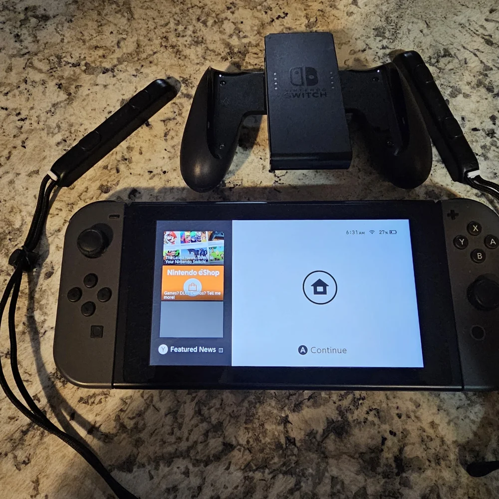 Nintendo Switch with Gray Joy-Con Controllers, Joy Con Grip, And 2 Games. No Doc